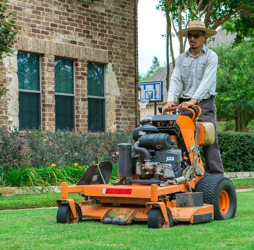 Rosa's Lawn Maintenance crew doing some lawn mowing